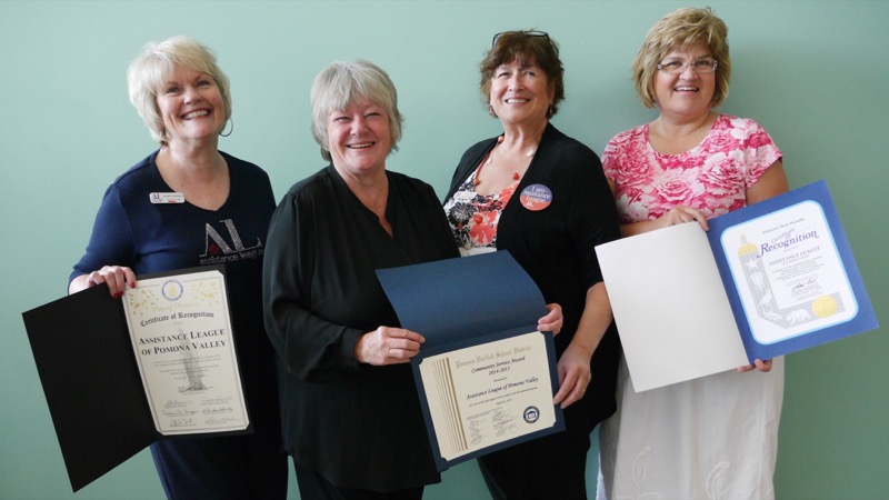 President Sharon Goodrich, Operation School Bell Chairman Stephanie Roberts, Community Clothes Closet Chairman Sally Boyd and President-Elect Cathy Harden with the Community Service Award Certificates